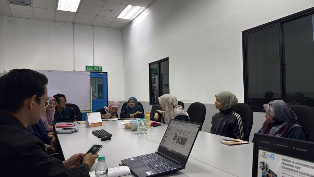 Energy and GHG awareness training session at Youngreem Electronic (M) Sdn Bhd: discussion around the training materials